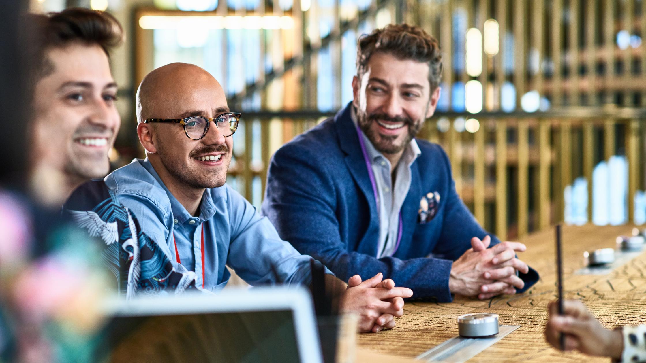 Cheerful businessmen in planning and strategy meeting