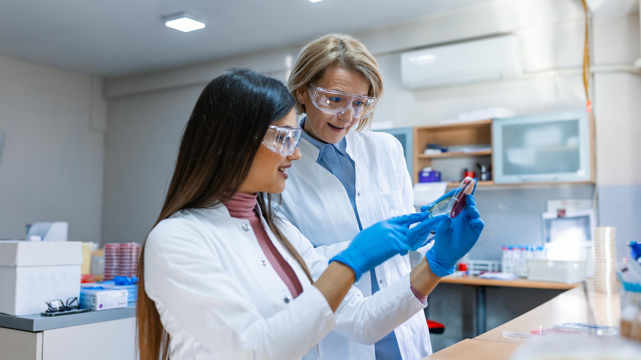 Two women working on a lab